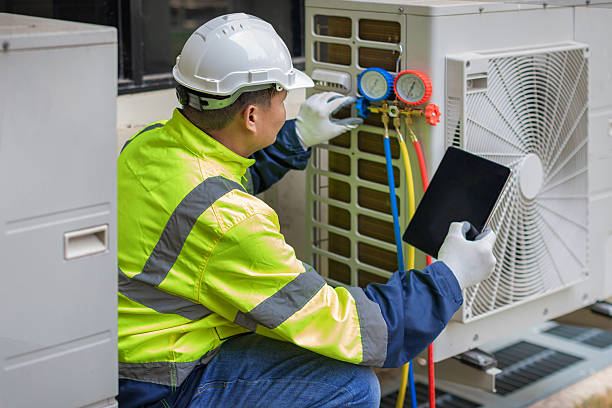 Professional Heat Pump Repair technician working in Orange, CA